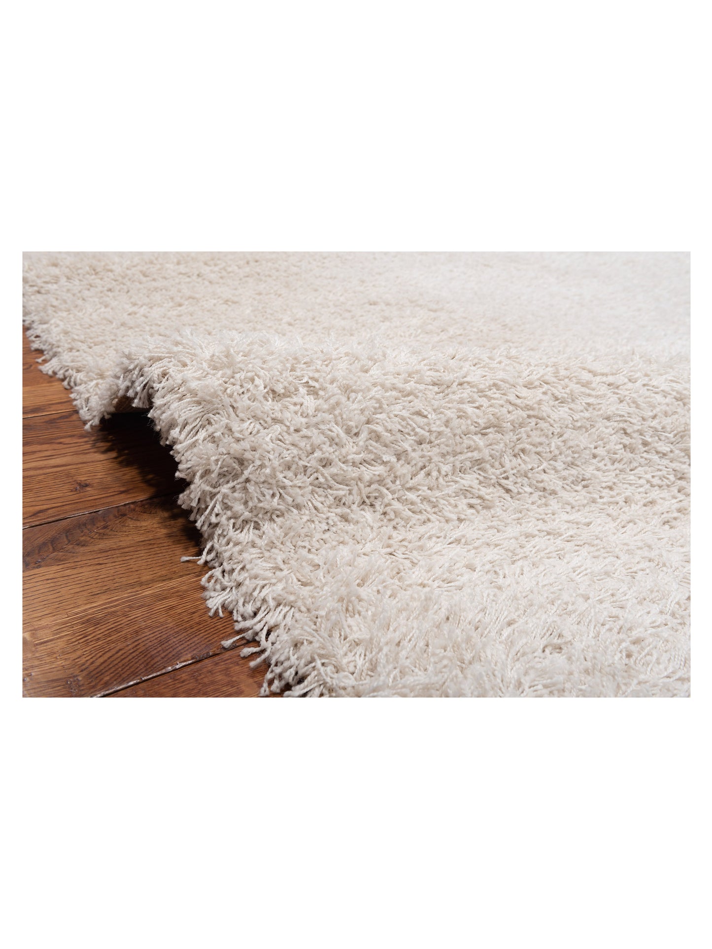Shaggy Ivory Ivory 7.10x11.2 Machine Made Rug